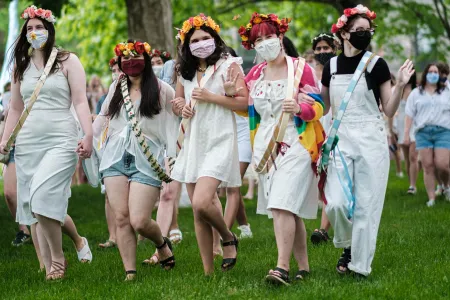 Students celebrate May Day 2021 around the May Pole