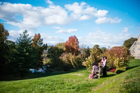 Students sitting on a bench 