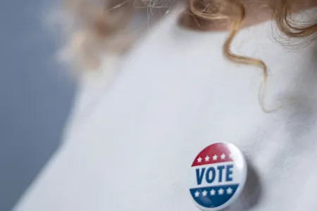 Person wearing a Vote pin