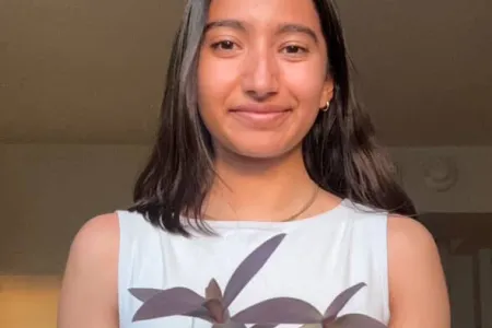 Sohini Sarkar holding plant