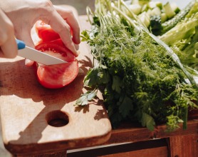 Photo of slicing a tomato