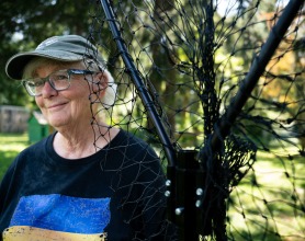 Barbara Miller ’75 poses with her favorite net
