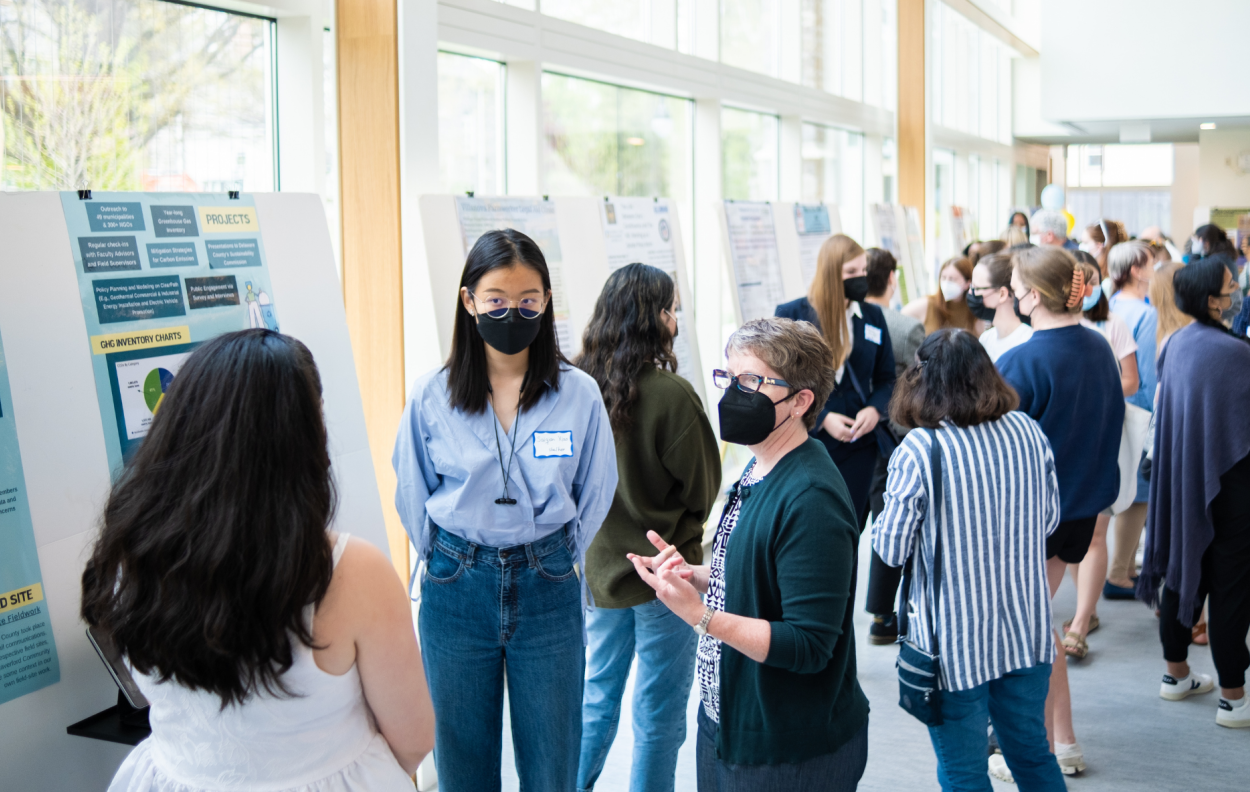 Students attending the Praxis Poster Session 2022