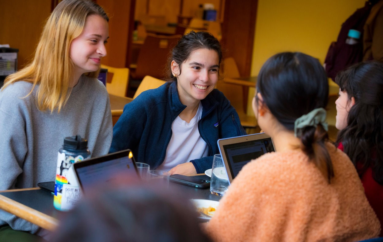 Students at computers in the dining hall