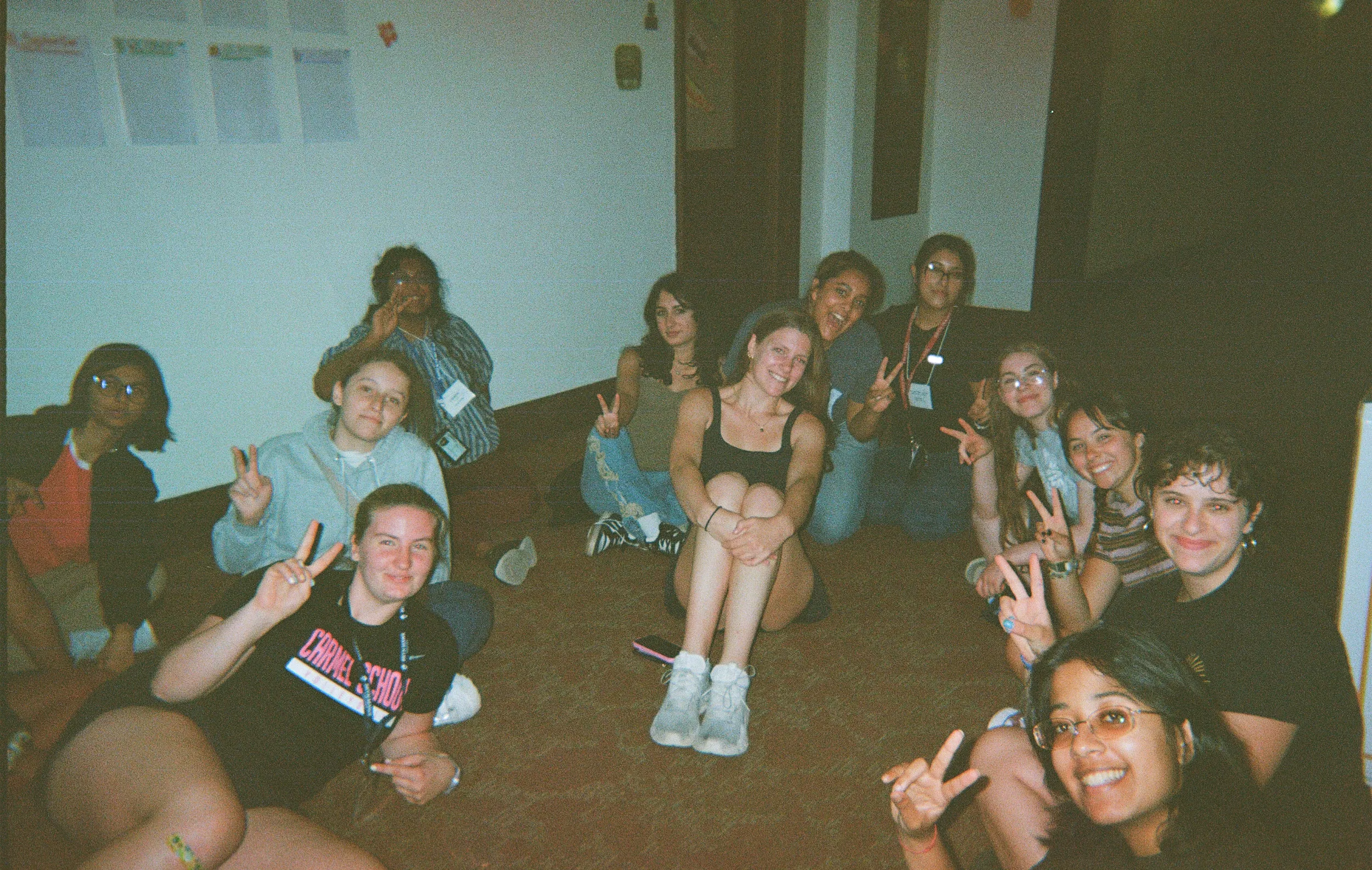 Group of Bryn Mawr students sitting on floor
