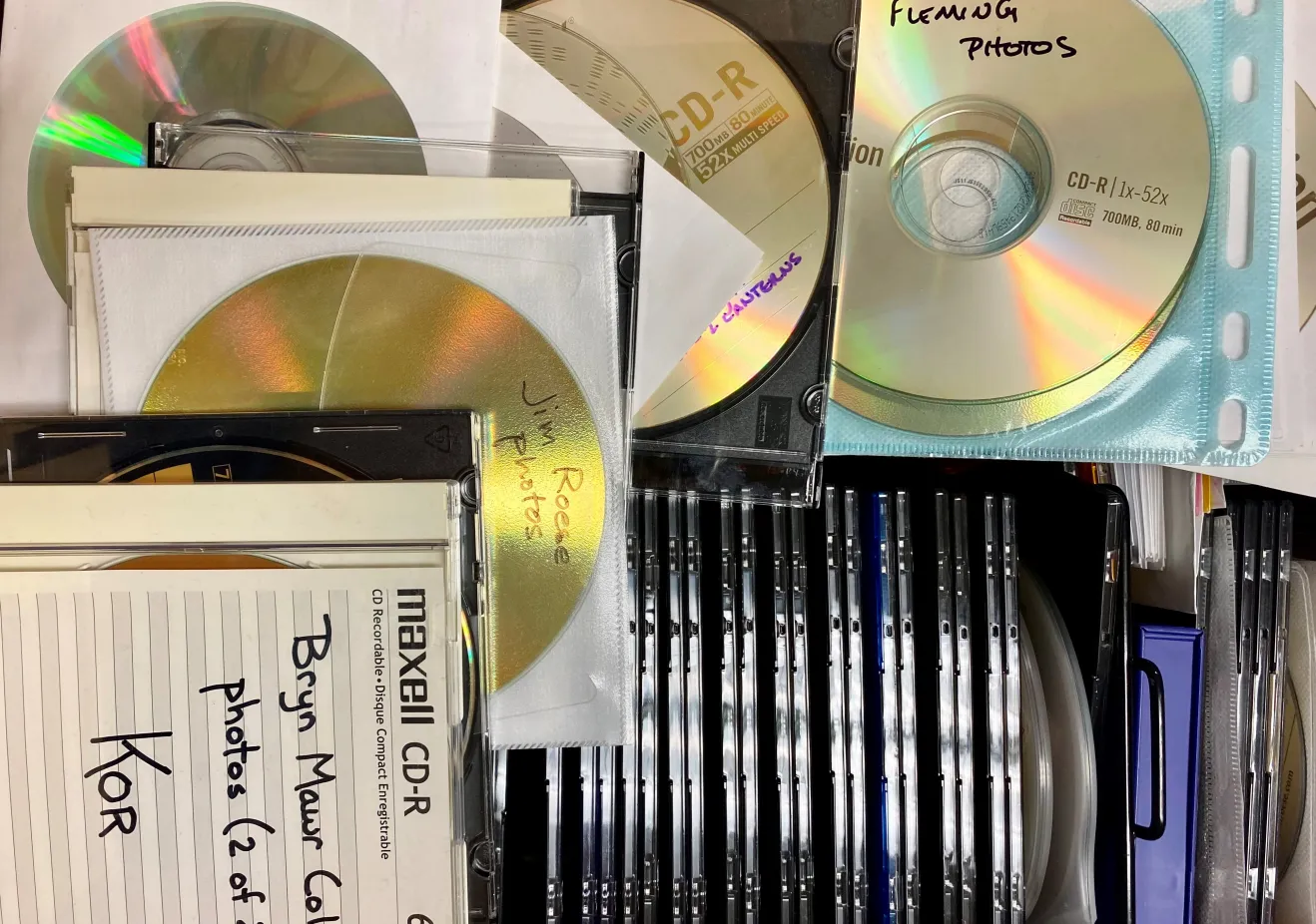 Photograph of the interior of a banker's box, filled with CD-Rom disks.