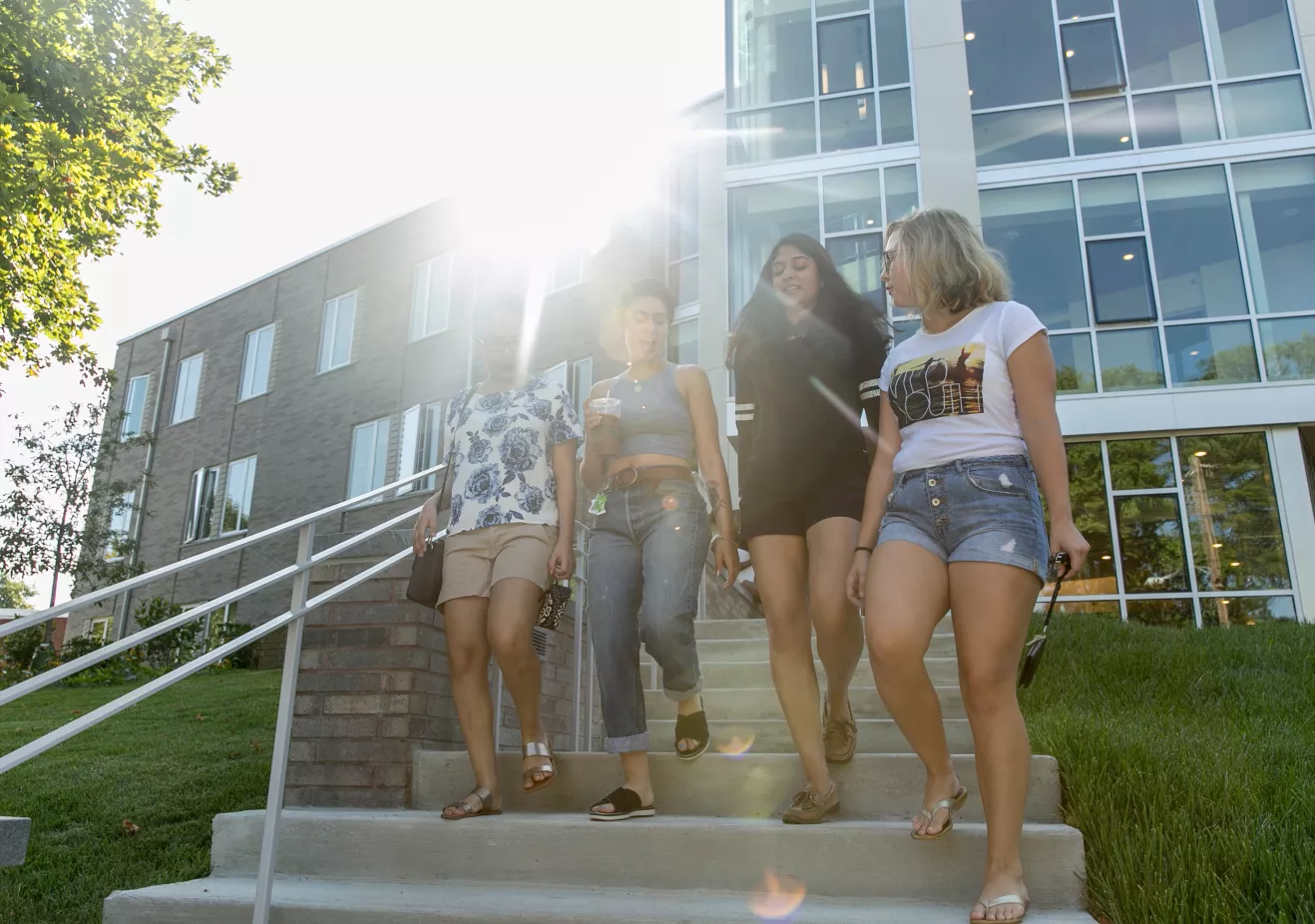 Students walking down the steps of New Dorm