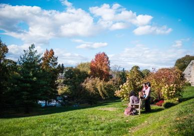 Students sitting on a bench 