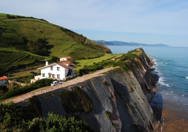 House and cliff