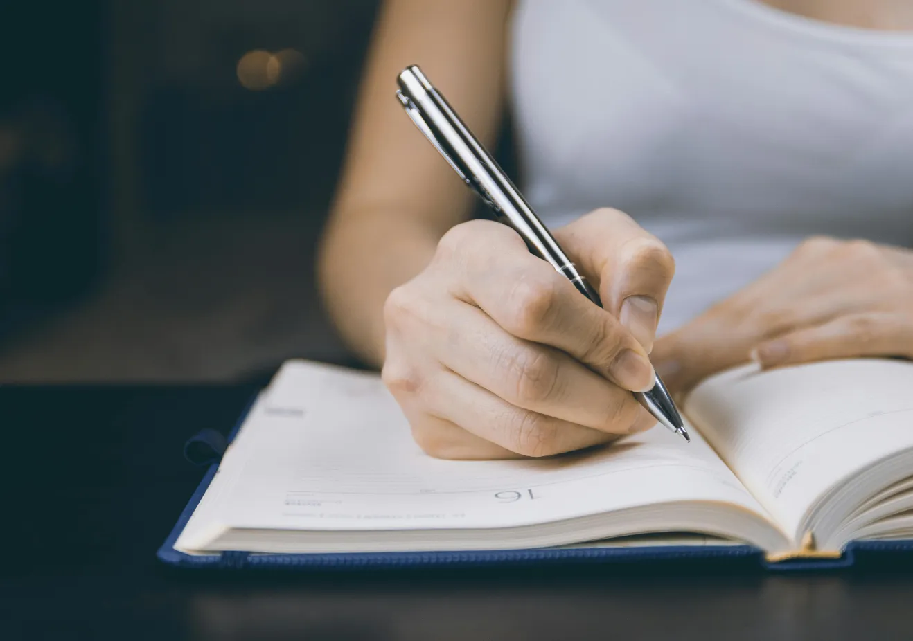 Writing in a notebook