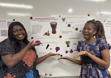 Two students at Math 201 poster session