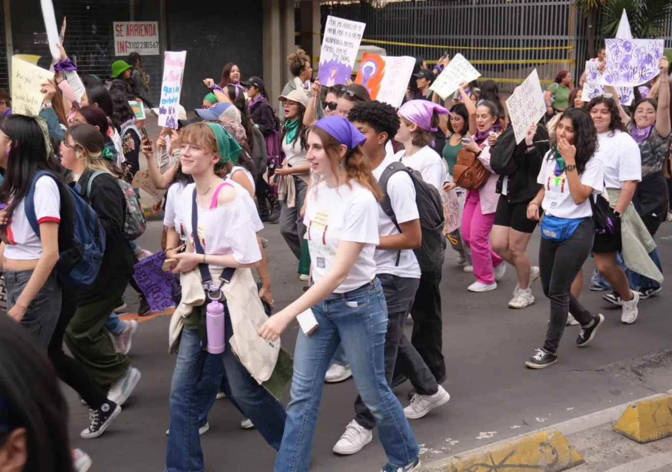 students marching in women's march