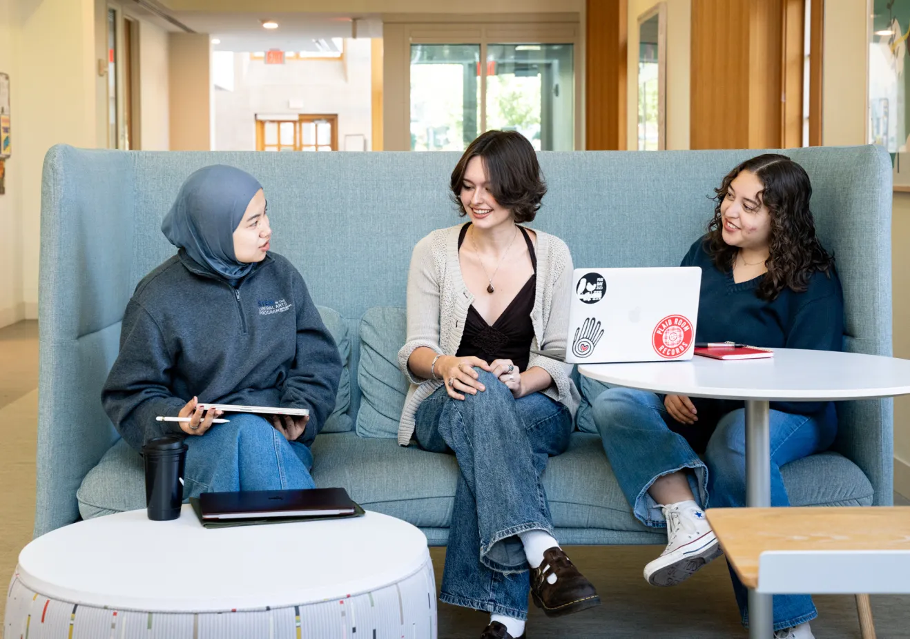 Students sitting and talking at a table