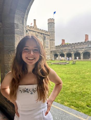 Camille standing in the Cloisters