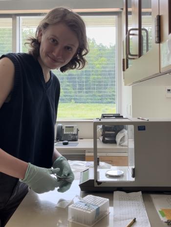 Skylar in a lab processing samples