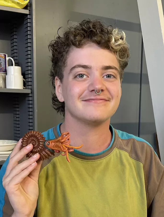 Maya Hofstetter '25 poses with a fossil at her summer internship