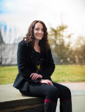 Lindsey Marinello Sitting on a Bench