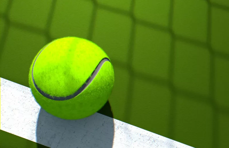 Image of a tennis ball on a tennis court