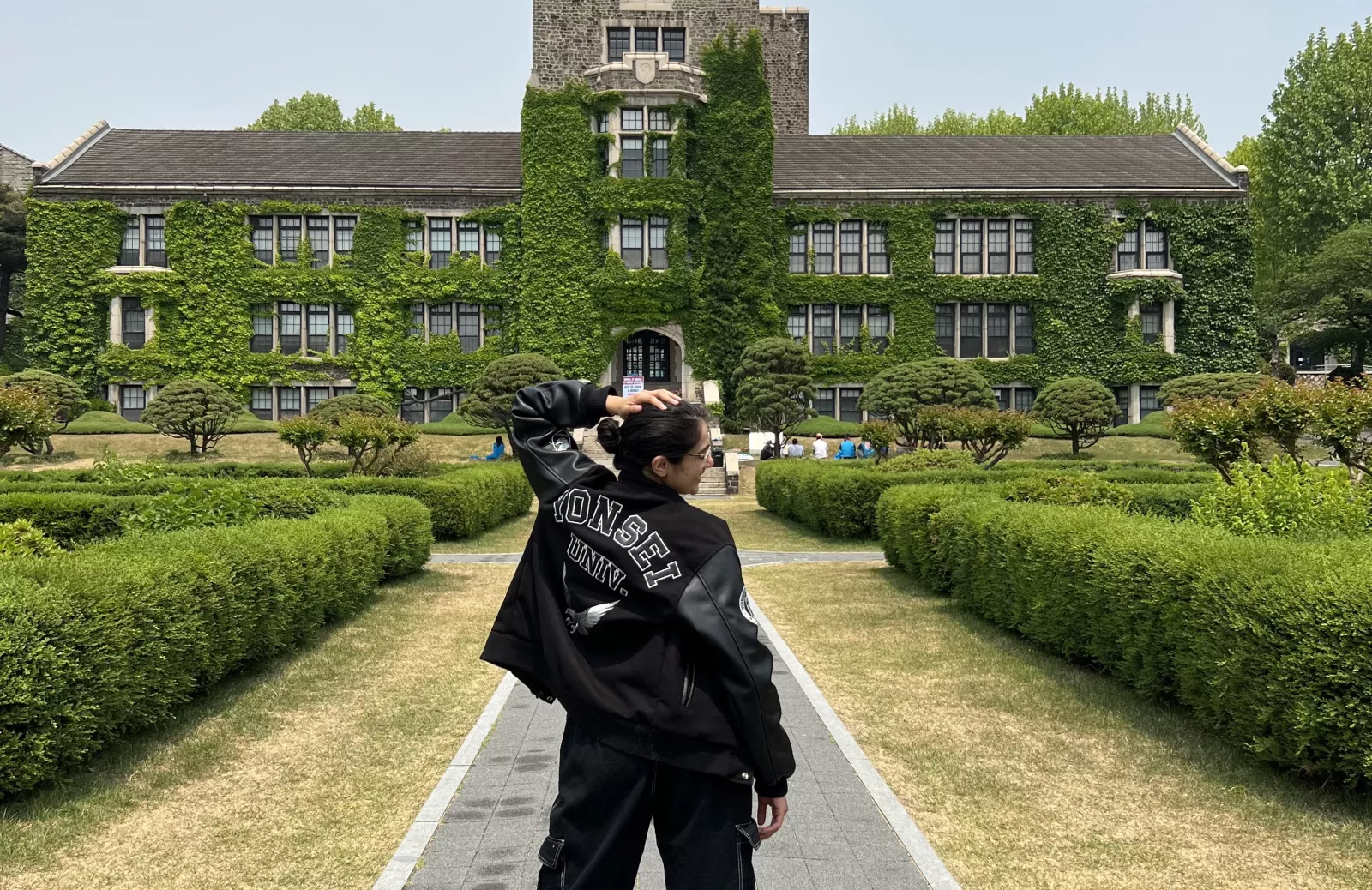 Aanandi posing in front of Yonsei University in Seoul, Korea