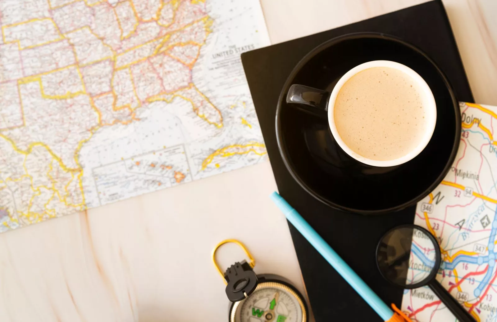 coffee cup with maps for travel