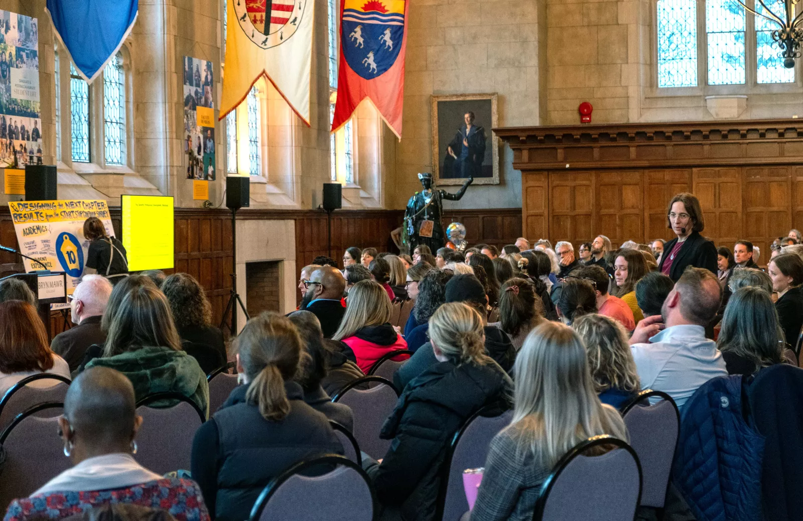 faculty and staff gathered in Great Hall