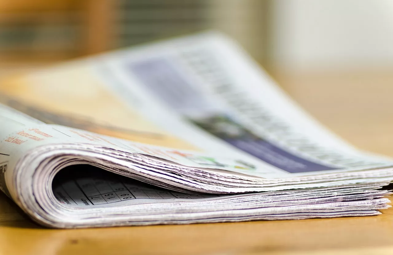 Newspaper on table