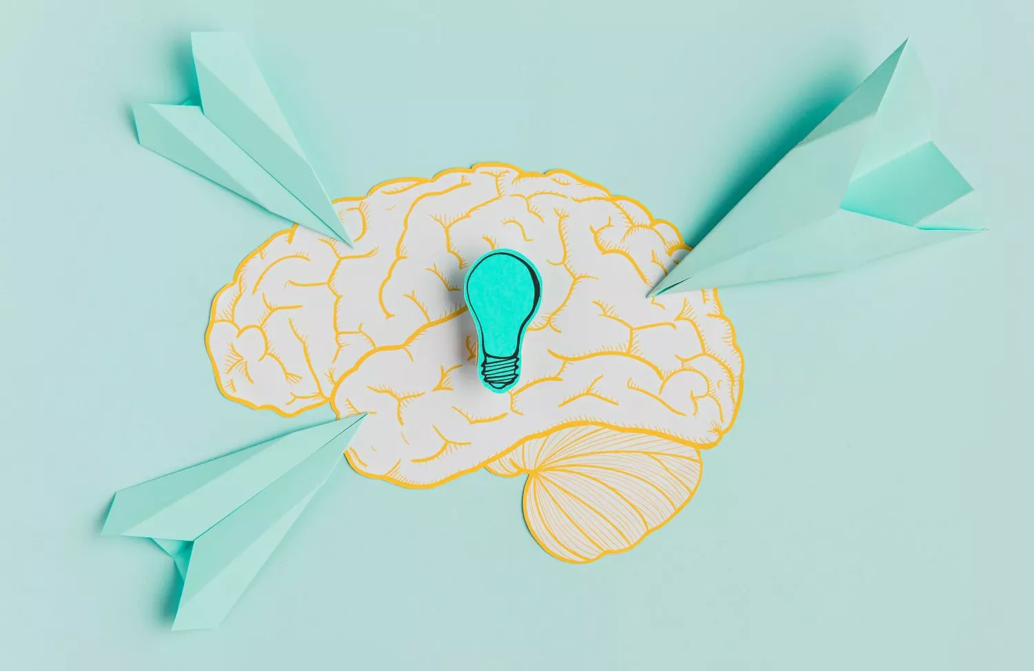 paper-airplanes-pointing-brain stock