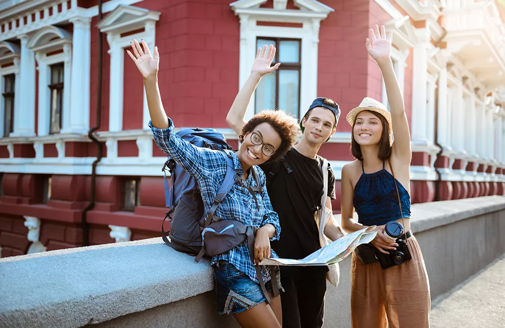Group of friends waving
