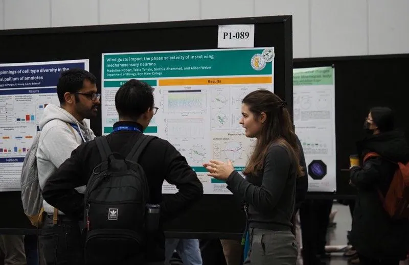 Madeleine presenting her poster