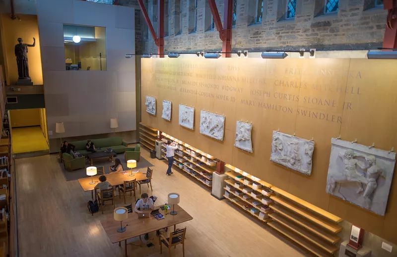Bryn Mawr's distinguished scholars in Archaeology, Classics, and History of Art are recognized on the atrium wall of Carpenter Library.