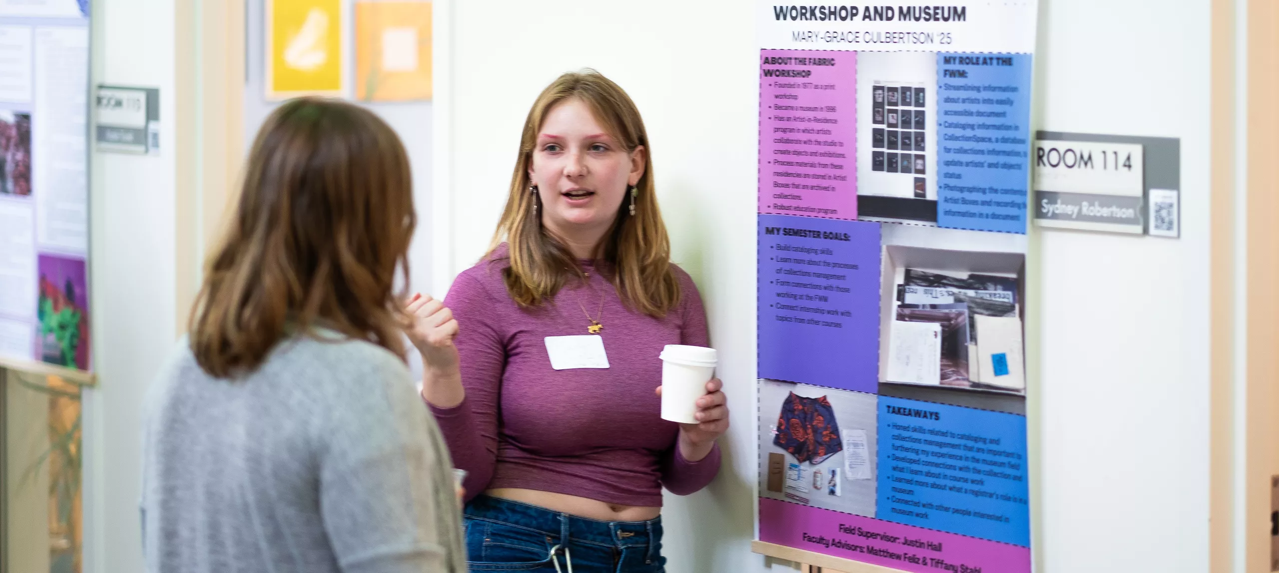 Student presenting during the Praxis Poster Session event