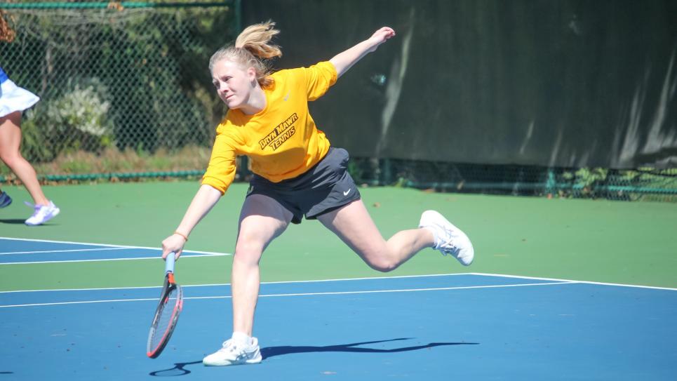 Lowrey West playing tennis