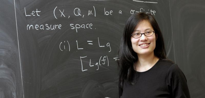 Leslie Cheng teaching at the chalkboard