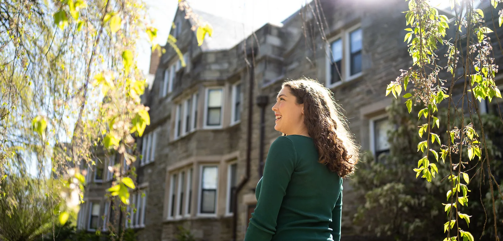 Student standing in the sunshine