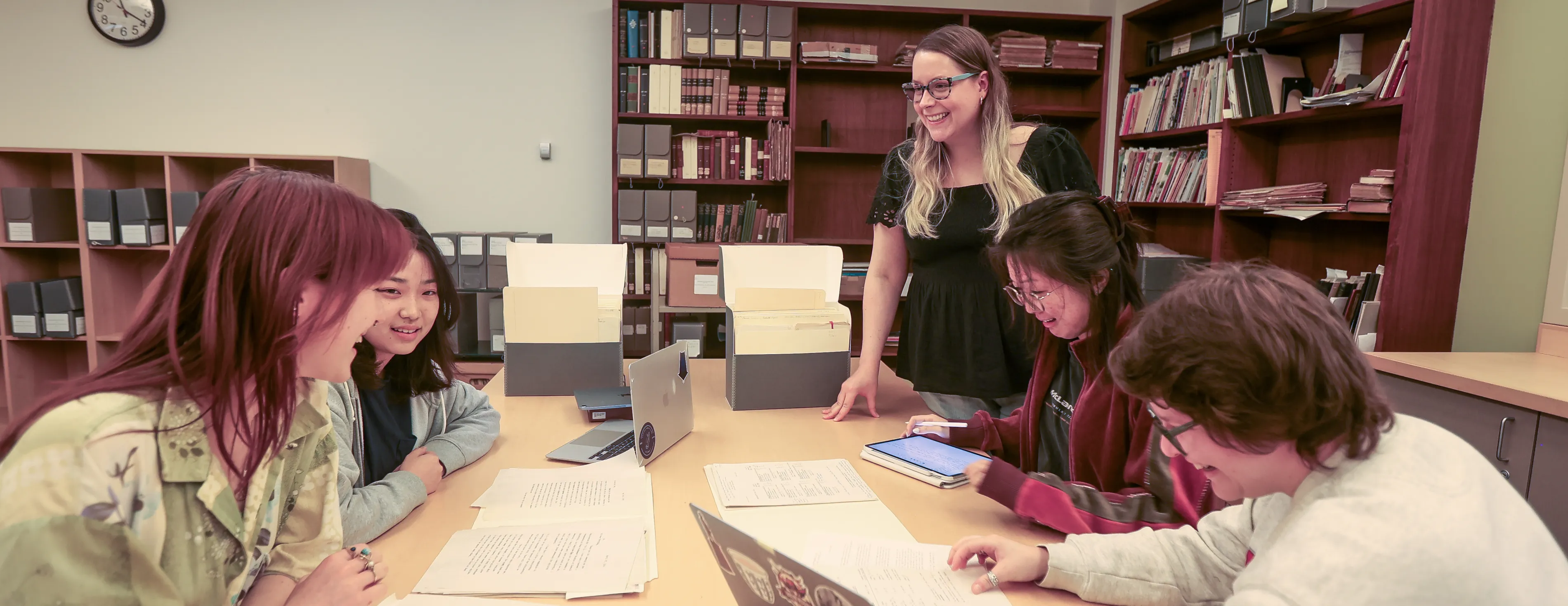 People doing research in the reading room.
