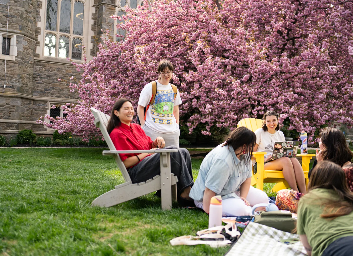 students laughing on campus