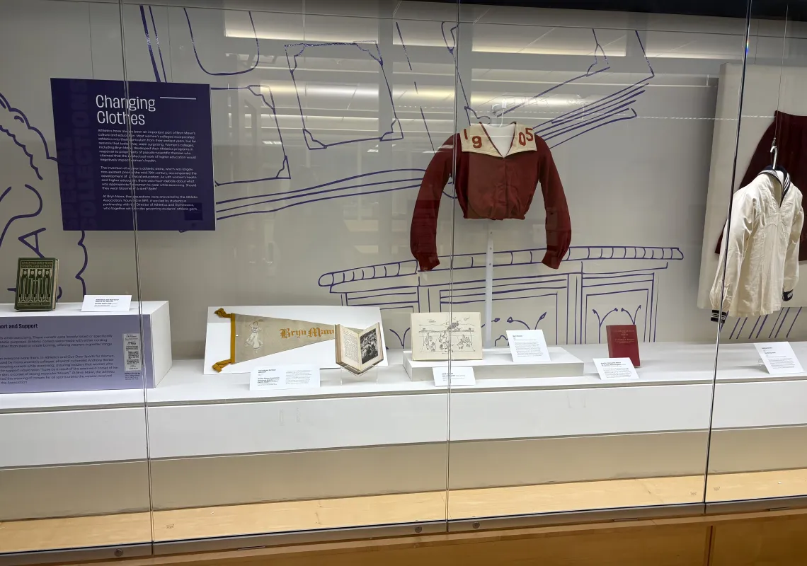 Display including historic outfits and a label that says "changing clothes"