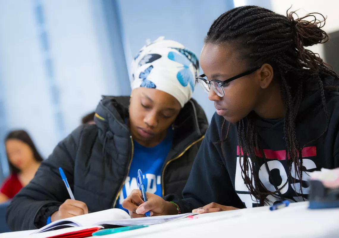 students taking notes in classroom