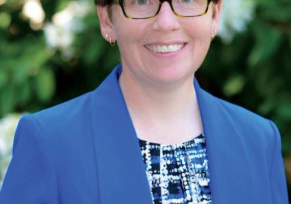 Portrait of Becky Ross in a blue blazer