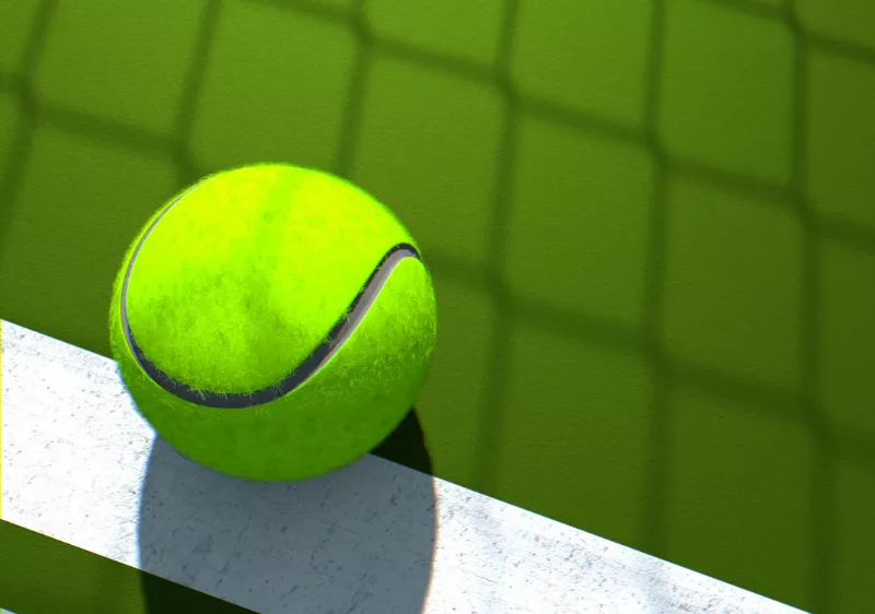 Image of a tennis ball on a tennis court
