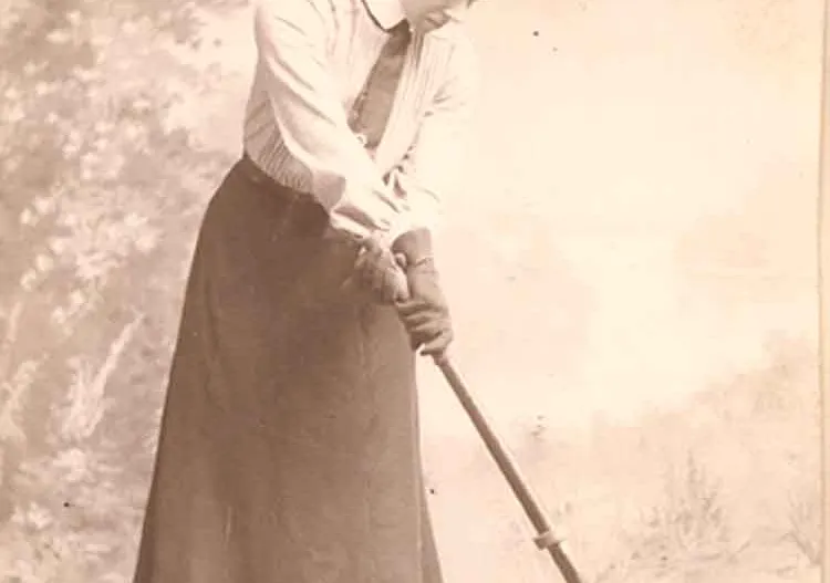 Constance Applebee holding a field hockey stick