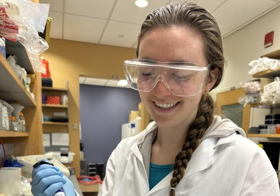 Student working in a lab. 