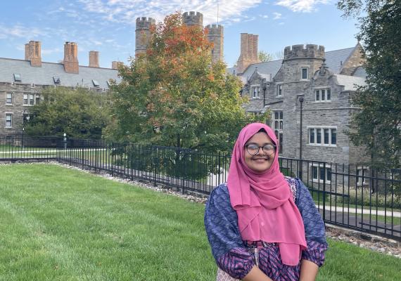 Sinthia standing in front of Rockefeller Hall.