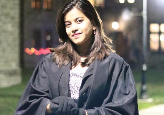 Kripa Lamicchane in a graduation gown. 