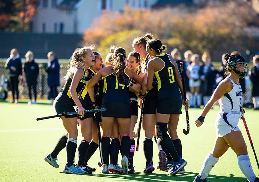 Field Hockey team hugs after winning Nov. 13 game