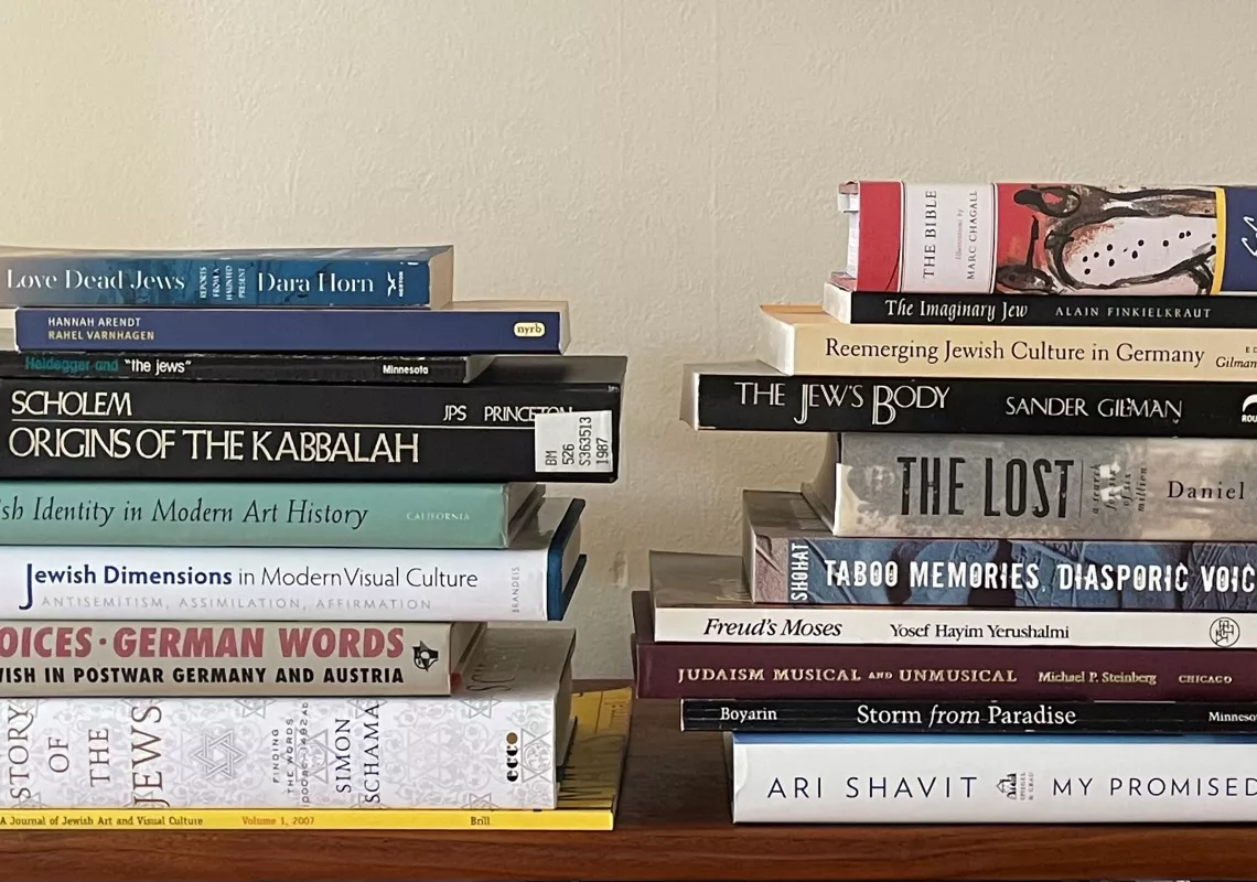 Table with two stacks of books