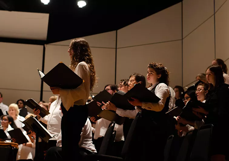 Student singing in a Bi-Co Chorale concert