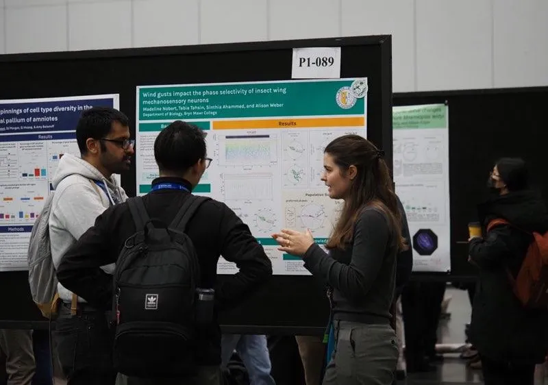 Madeleine presenting her poster