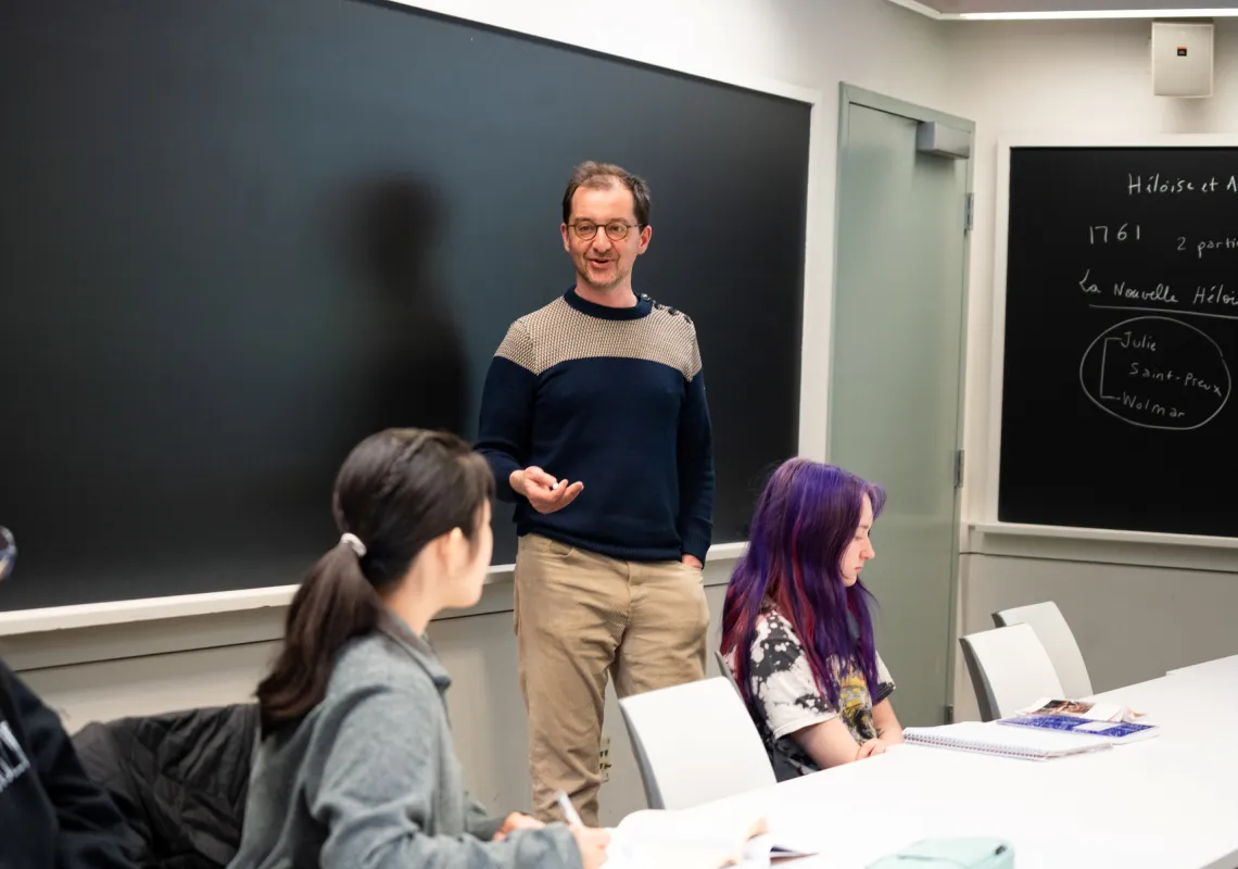 Rudy sharing his faculty research during class