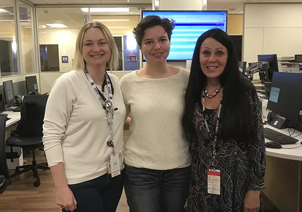 Toni Ekerdt '19  (center), Jan (Hangen) Walker '79, and Melanie Cree Green ’99. All three are biology majors and green lanterns.